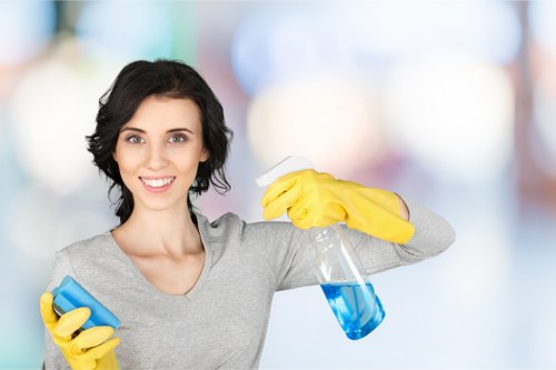 Professional cleaner following health and safety standards on site
