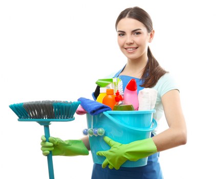 Trained cleaner using protective equipment during cleaning